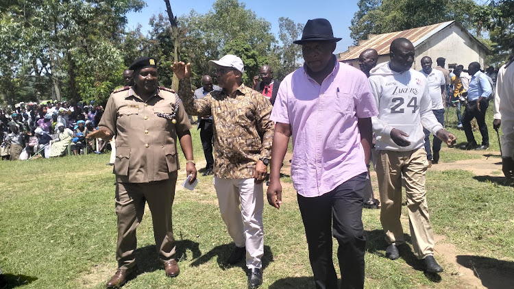 Homa Bay county commissioner Moses Lilan, Water and Sanitation Cabinet Secretary Antony Njeru and Lake Victoria South Water Works Development Agency (LVSWWDA) chairman Odoyo Owidi at Rakwaro chiefs camp in Karachuonyo constituency on April 22,2024.