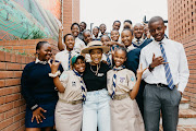 Nomzamo Mbatha and students from JL Dube High School.