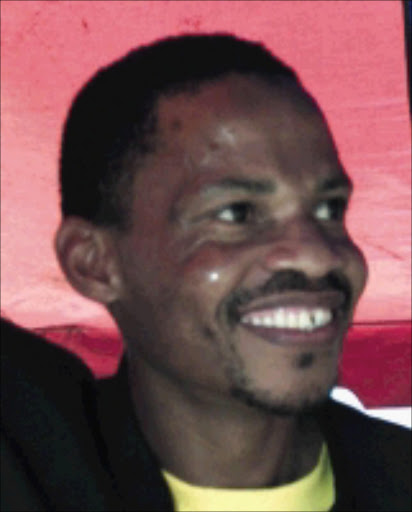 Gauteng Provincial Chairperson Malesela Ledwaba greets the crowd during the comemoration of Robert Sobukwe in Diepsloot. Pic: TLADI KHUELE. 28/02/2008. © Sowetan.