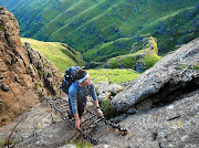 June Fabian tackles the chain ladders at the start of the Drakensberg Grand Traverse.