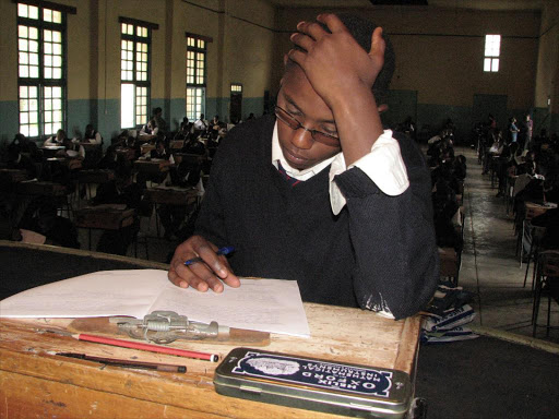 Menengai High School student in Nakuru sit his English paper 2./FILE