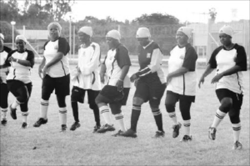 RARE BREED: Vakhegula Vakhegula, the soccer-playing grannies from Tzaneen, training for next month's trip to Massachusetts in the US. They have captured the imagination of the world but need funding. Pic. ELIJAR MUSHIANA. 26/05/2010. © Sowetan. 26 MAY 2010 WEDNESDAY: GO USA: Limpopo soccer playing grannies, Vakhegula-vakhegula from Tzaneen are training in preparation for their trip to USA in July. They are still struggling to raise funds for a flight, accomodation and food, They raised R100 000 and the balance is R400 000. PHOTO: ELIJAR MUSHIANA