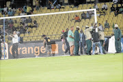 EXTRA LEAN: Goalposts being fixed during the  Africa Cup of Nations clash between Togo and Algeria at Royal Bafokeng Stadium  in Rustenburg on Saturday. 
      Photo: Veli Nhlapo