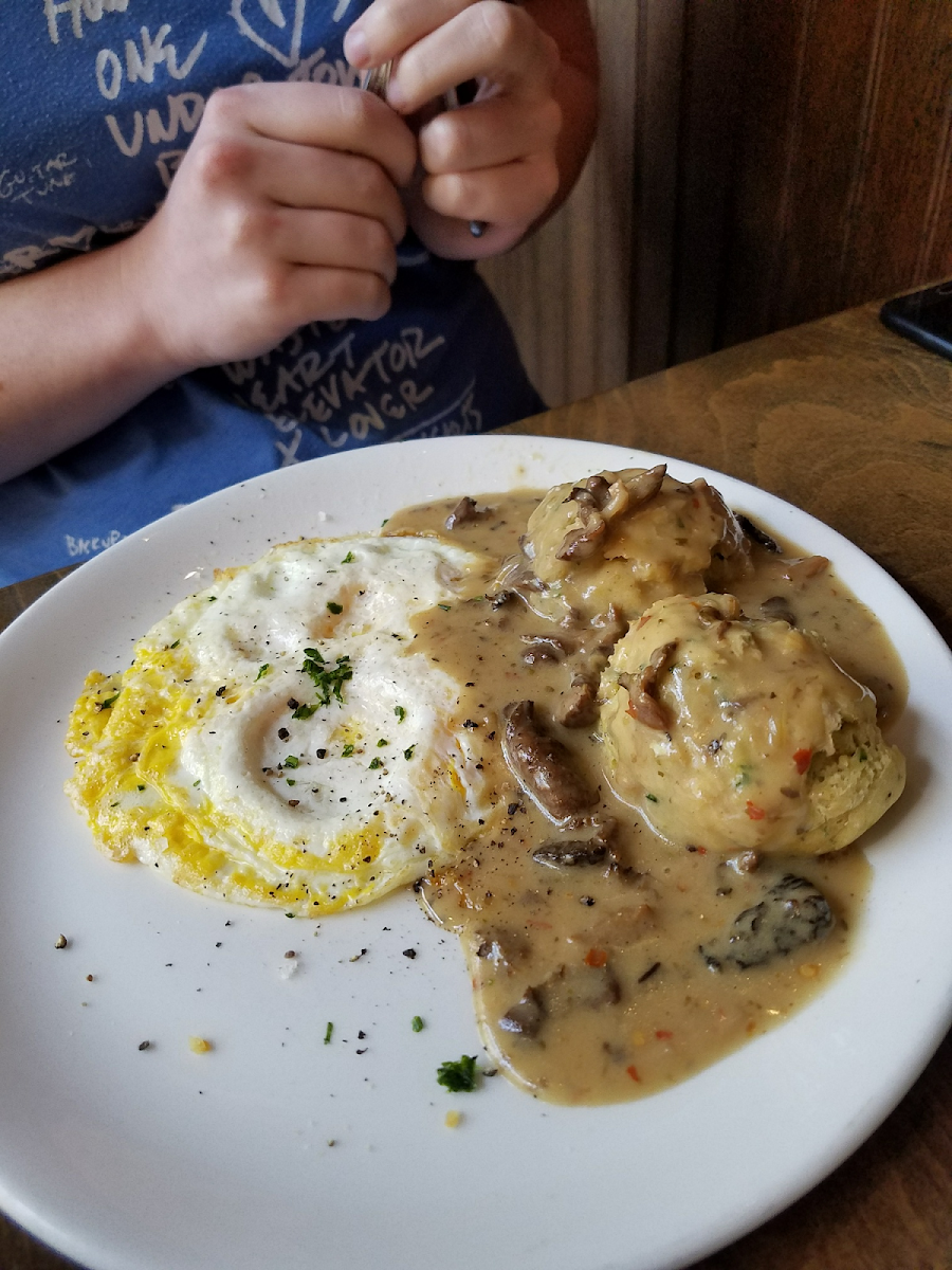 Vegan biscuits and gravy with a fried egg