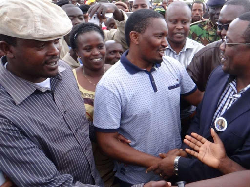 Newly appointed devolution cabinet secretary Mwangi Kiunjuri (in a t-shirt) being received by Laikipia county deputy governor Gitonga Kabugi during the burial of Ephraim Kamakia, the former leader of majority at the local assembly on December 21 last year.
