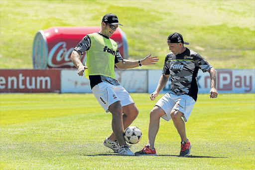 FANCY FOOTWORK: Cricketers Colin Ackermann, left, and Andrew Birch of the Warriors show their soccer skills during a training session at Buffalo Park yesterday Picture: SIBONGILE NGALWA