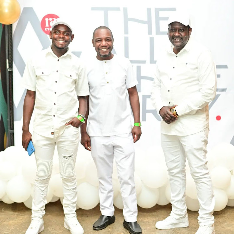 A friend, Victor Ber and Comedian Daniel Ndambuki during the All White Party at the Nairobi Street Kitchen in Westlands, Nairobi on September 22, 2023