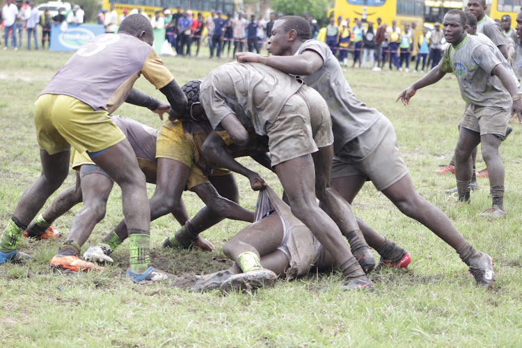 Butula Boys' (in yellow shorts) in action against Kisii Boys during their opening match on Tuesday