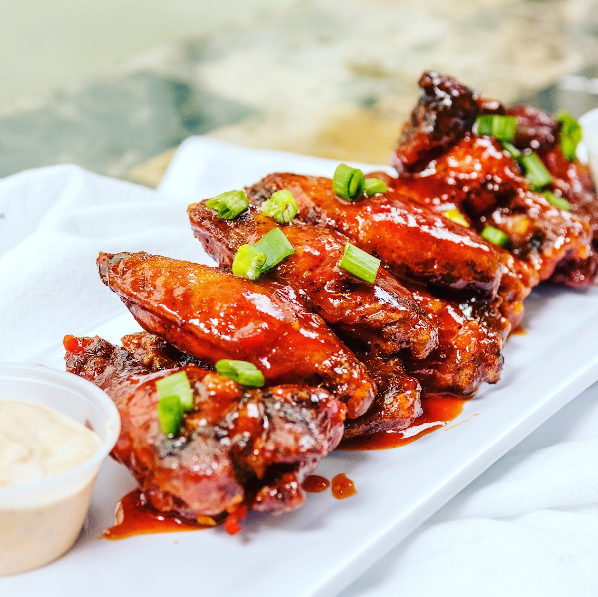 Honey Chipotle Chicken Wings 
How are chipotle sauce is house made 
Our wings are fried without flour 
This item is 100% gluten-free