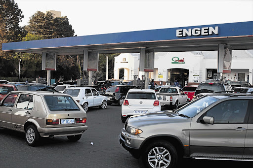 South Africa will be hit by the second-highest petrol price increase in three years as motorists tried to fill up at the Engen garage in Rosebank last night Picture: THAPELO MOTSUMI