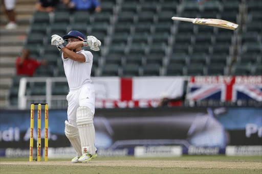 England batsman James Taylor looses his grip while playing a shot during day two of the third Test match between South Africa and England at Wanderers Stadium in Johannesburg on January 15, 2016.