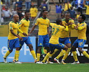 Mamelodi Sundowns players celebrate a goal.