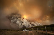 07 June 2017 Plettenberg Bay. A massive fire broke out at the Kranshoek Viewpoint area just outside the coastal holiday town early on Wednesday morning. It quickly spread due to strong wind and burnt along the coast and cut inland by midday towards Cairnbrogie and the Kranshoek community. This is just one several fires which raged between Plettenberg Bay and Mossel Bay yesterday. 
(Photo Ewald Stander)