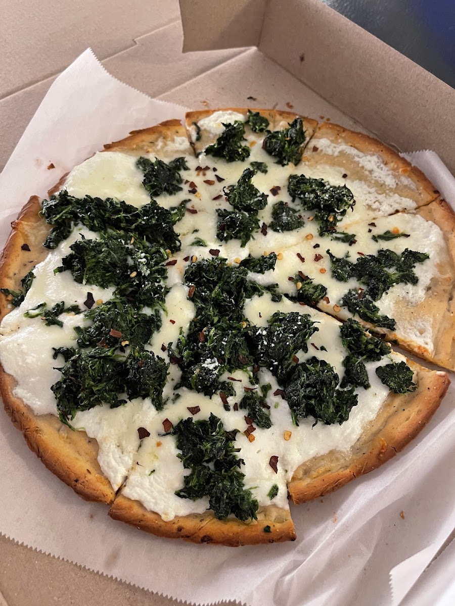 Keto white velvet pizza with added spinach