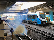 Prasa's new SA-made commuter train at Cape Town station on Tuesday. A factory in Nigel is producing 30 coaches a month.
