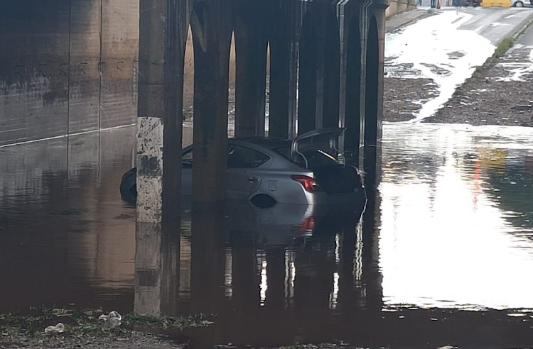 Ekurhuleni EMS confirmed the motorist who tried to cross the flooded bridge was declared dead at the scene.