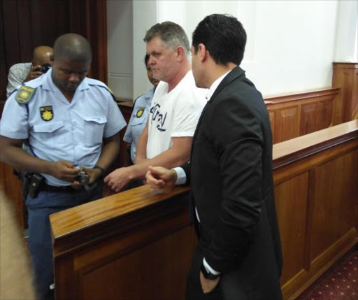 Jason Rohde arrives in the High Court in Cape Town on Wednesday wearing a T-shirt and shorts. Picture: Philani Nombembe