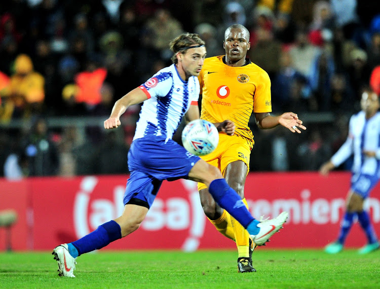 Kaizer Chiefs midfield strongman Willard Katsande (R) vies for the ball with Andrea Fileccia of Maritzburg United during the Absa Premiership match at Harry Gwala Stadium in Pietermaritzburg on August 17 2018.