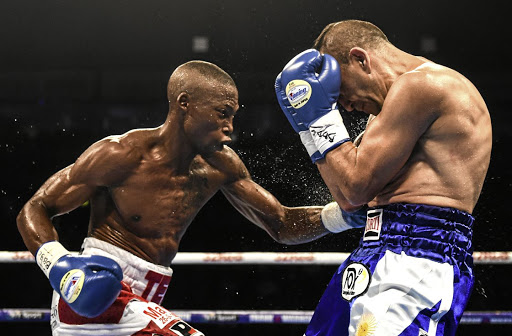 Zolani Tete lands a punch at Andres Narvaez during their fight in Ireland.