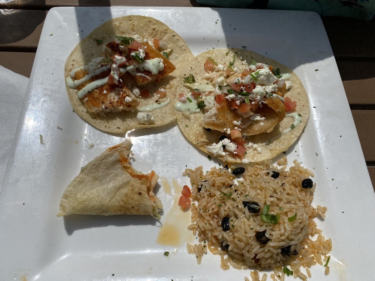 Fish tacos on corn torillas, grilled instead of fried.