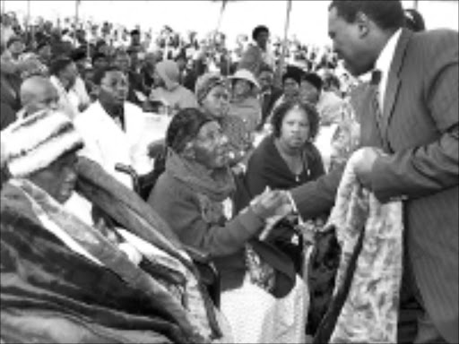 REMEMBER: Mafosi Ntenza, 88, and Eveline Ncemu are among the few survivors of the group of 500 women who marched to the magistrate's court in Ixopo in 1959 to protest against pass laws and labour conditions. Finance and economic development MEC Zweli Mkhize gave them blankets. © Sowetan.