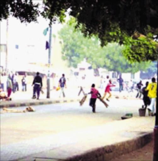 SECTARIAN MAYHEM: One of the scenes during the Muslim-Christian clashes in Bauchi. © Sun News Publishing.
