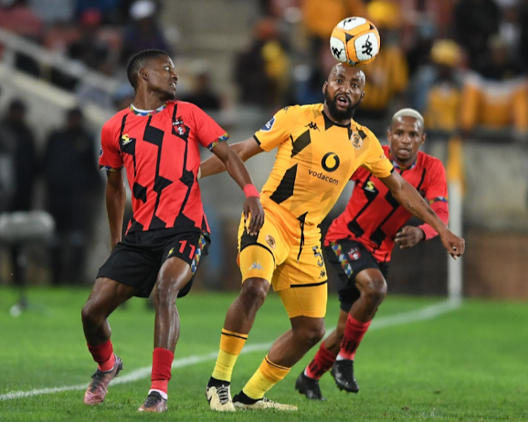 Sibongiseni Mthethwa of Kaizer Chiefs competes for the ball with TS Galaxy's Sphiwe Mahlangu in their DStv Premiership match at Peter Mokaba Stadium in Polokwane on Tuesday night.