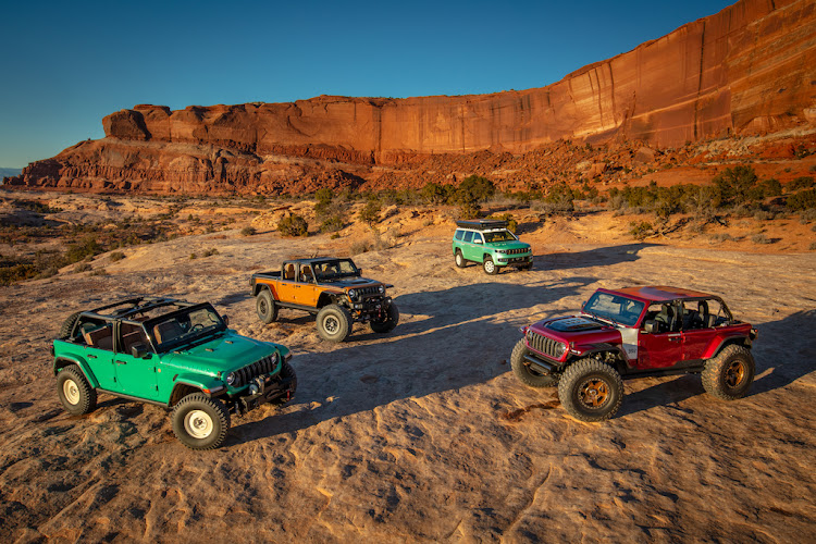 The 2024 Easter Jeep Safari concepts (clockwise, left to right): Jeep Willys Dispatcher concept, Jeep Gladiator Rubicon High Top concept, Jeep Vacationeer concept and Jeep Low Down concept.