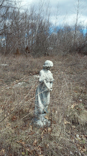 Statue In The Woods