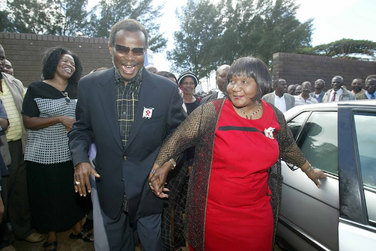 Mangosuthu and Irene Buthelezi arrive at KwaPhindangene tribal court in Mahlabathini to vote in 2014.