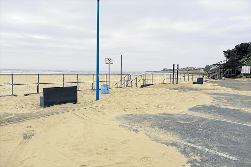 OFF LIMITS: Sand covers the parking spaces at Gonubie Beach parking area Picture: STEPHANIE LLOYD