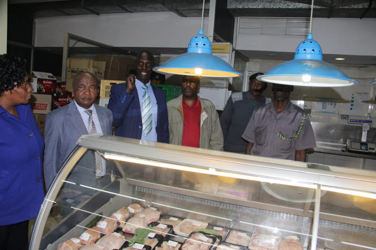 Nairobi County officials during the inspection at a city supermarket in the CBD.