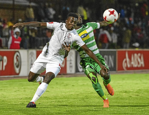 Thabo Maphakisa of Free State Stars, left, and Deon Hotto of Celtic during Saturday's game.