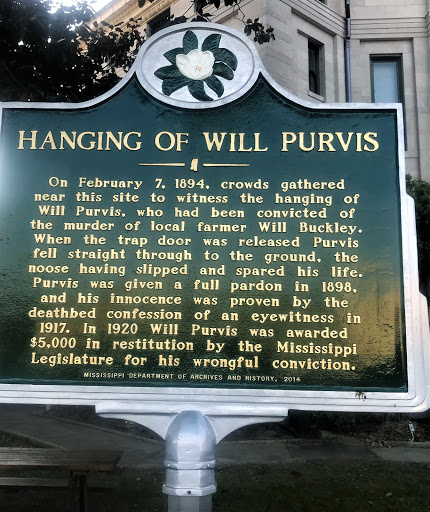 On February 7, 1894, crowds gathered near this site to witness the hanging of Will Purvis, who had been convicted of the murder of local farmer Will Buckley. When the trap door was released Purvis...