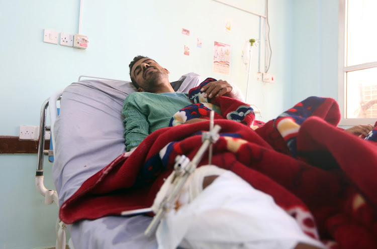 A man lies on a hospital bed after he was injured by a Katyusha missile strike by Houthis in the city of Marib, Yemen on May 22, 2018.
