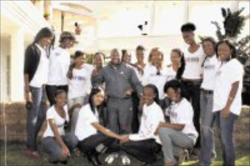 MOTIVATIONAL TALKS: Miss Face of Soweto finalists with Sowetan columnist Lucky Mazibuko at a Mother's Day function at Varados. Pic. Vathiswa Ruselo. 12/05/08. © Sowetan.