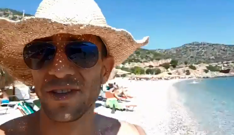 Adam Catzavelos filmed himself on a beach in Greece, celebrating the fact that there were no black people there.