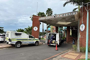 Police at the Umhlathuze municipal offices in Richards Bay after a shooting which left two people dead on Thursday.