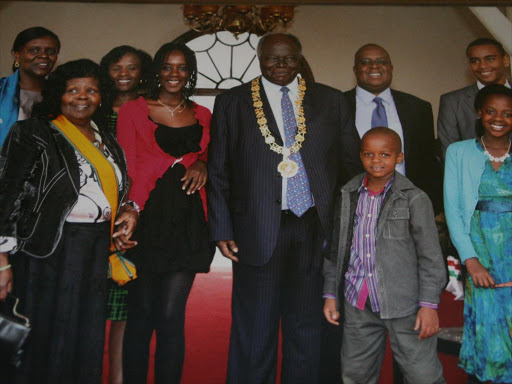 President Mwai Kibaki and First Lady Lucy Kibaki with family members at State House, Nairobi, after the promulgation of the new constitution in 2010. / FILE