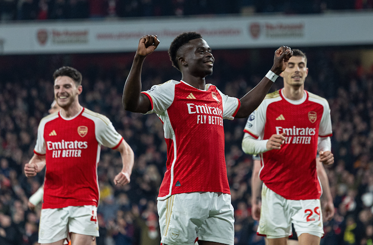 Arsenal's Bukayo Saka celebrates after scoring in a recent English Premier League match b