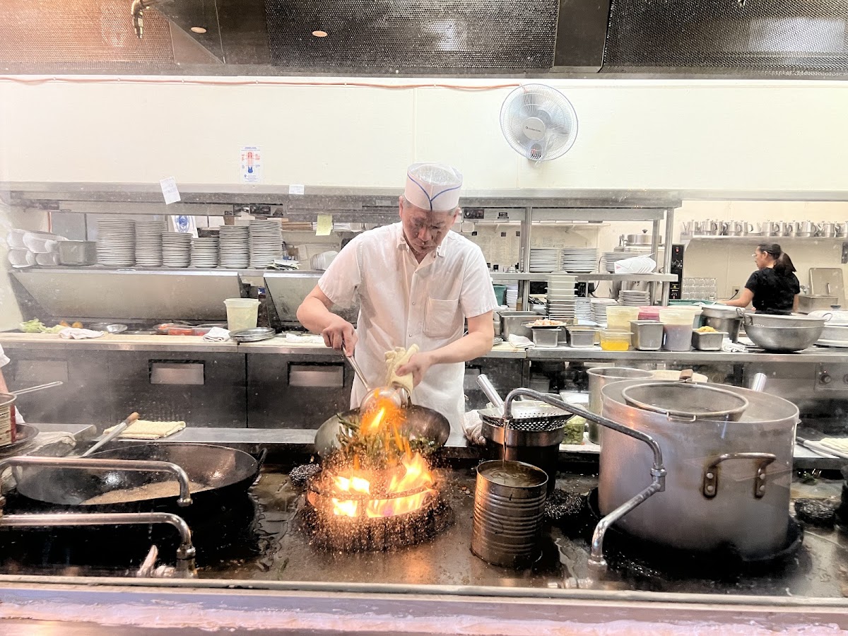 This is the chef and that is the wok. Our table was on the other side of the glass.