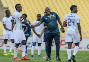 Jubilant Platinum Stars players and staff after the final whistle declared them winners of the match during the Absa Premiership match between Platinum Stars and Bidvest Wits at Royal Bafokeng Stadium on May 12, 2018 in Rustenburg, South Africa.