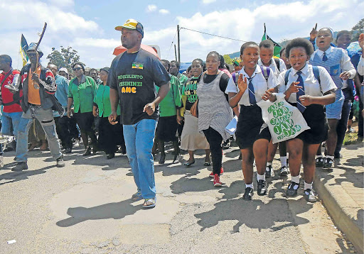 CLOSE IT DOWN: Ngcobo residents and pupils march on the Ngcobo Magistrate’s Court calling on Justice Minister Michael Masutha to shut down the controversial Angels Ministry Church in Nyanga village Picture:SIKHO NTSHOBANE