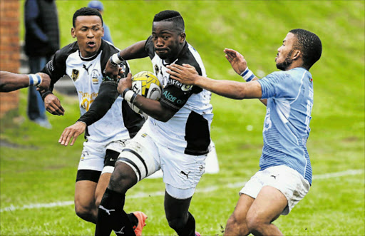 FULL THROTTLE: Old Boy's Siyamthanda Mgubo runs with the ball, while supported by teammate Foxy Ntleki, during their game against Progress Uitenhage at Old Boys Club at the weekend. Picture: ALAN EASON