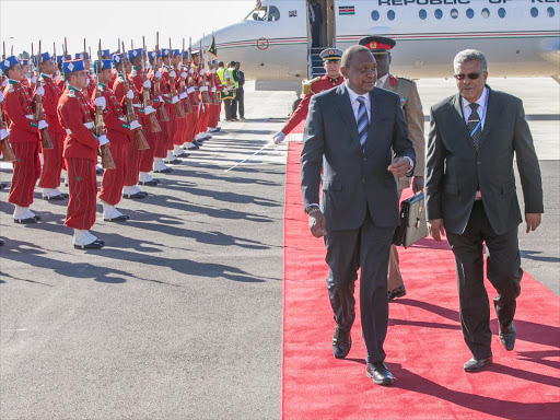 President Uhuru Kenyatta is received by a Senior Morocco Government official on arrival at Marrakech International Airport in Morocco where he is scheduled to attend the COP22 Climate Change conference, November 15, 2016. /PSCU