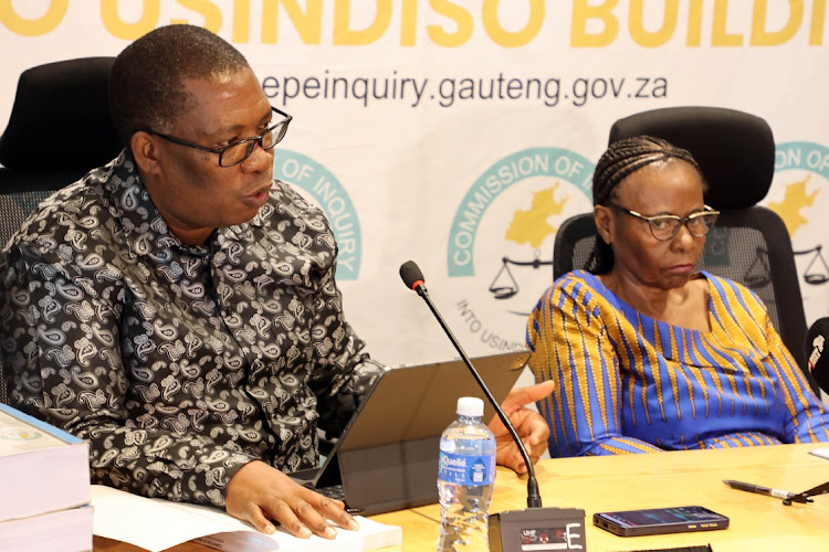Gauteng premier Panyaza Lesufi and Justice Sisi Khampepe during the officially hand over of the Usindiso Building Commission of Inquiry in Midrand , Johannesburg.
