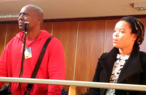 IN THE DOCK: Twelve Apostles Church member Zola Mazinyana and his wife Zukiswa appeared in the East London Magistrate’s Court yesterday on charges of fraud totalling R7.09-million Picture: RAY HARTLE