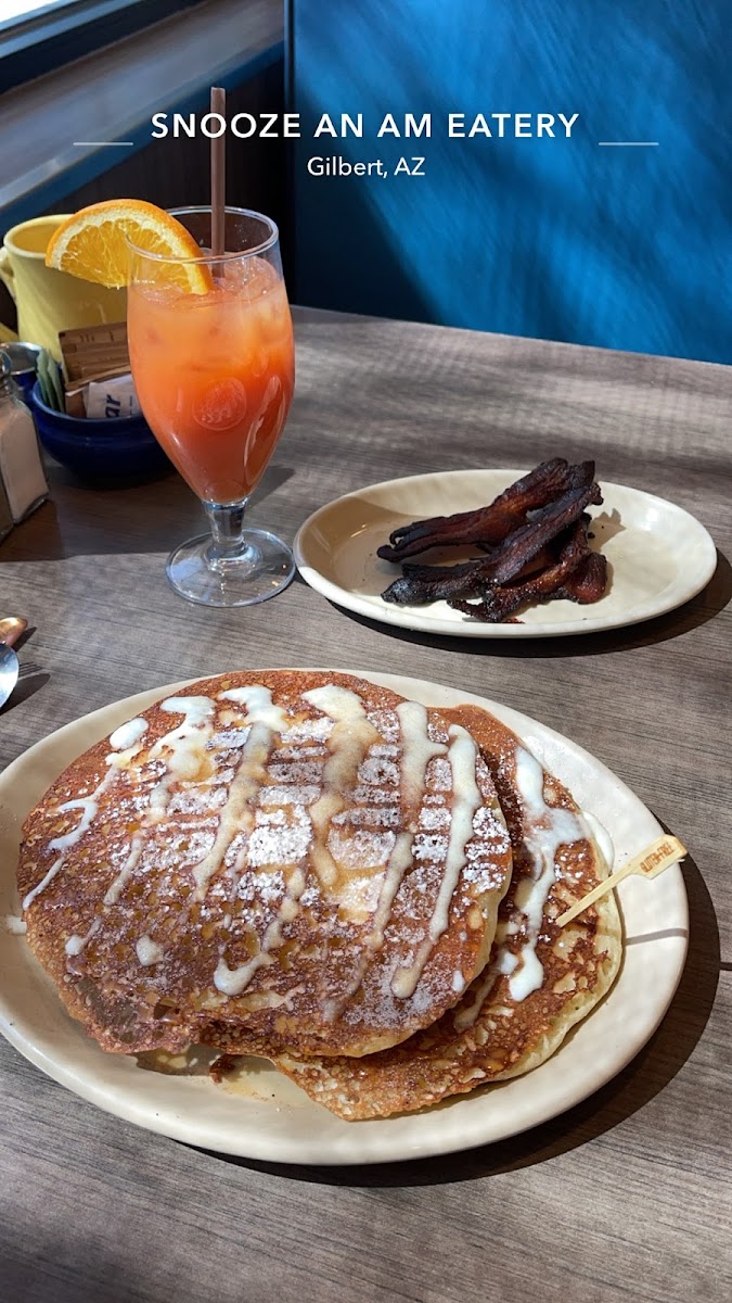 Gluten-free churro pancakes w/side of bagon and some alcoholic drink