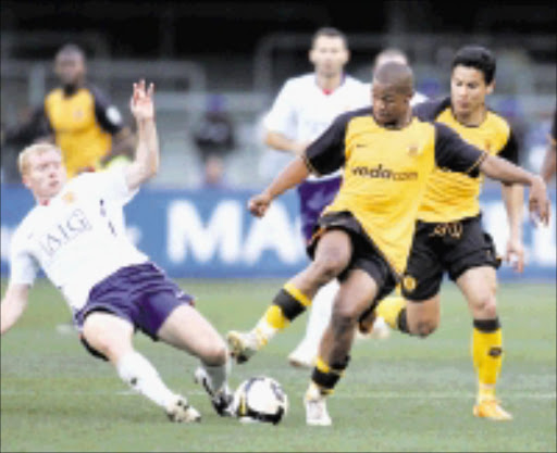 Chiefs player Gert Schalkwyk and Manchester player Paul Scholes\n19 July 2008, Kaizer Chiefs v Manchester United, Vodacom Challenge, Newlands Stadiun, Newlands, Cape Town, RSA,\nCredit:Abbey Sebetha / eimage\n\nSLIDING IN: Kaizer Chiefs' Gert Schalkwyk is tackled by Manchester United's Paul Scholes during their Vodacom Challenge clash at Newlands Stadium in Cape Town on Saturday. sow 21/07/08. page34.