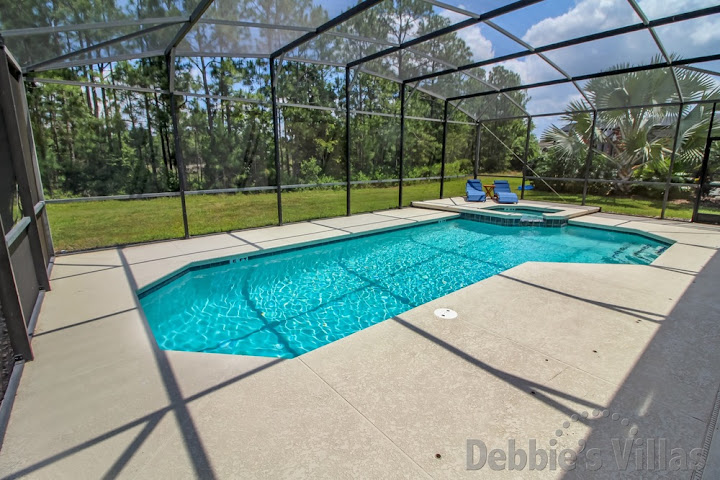 Stunning view across the private pool and spa on Watersong